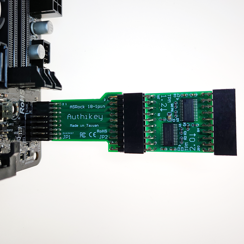 Authikey TPM module installed on an ASRock motherboard header