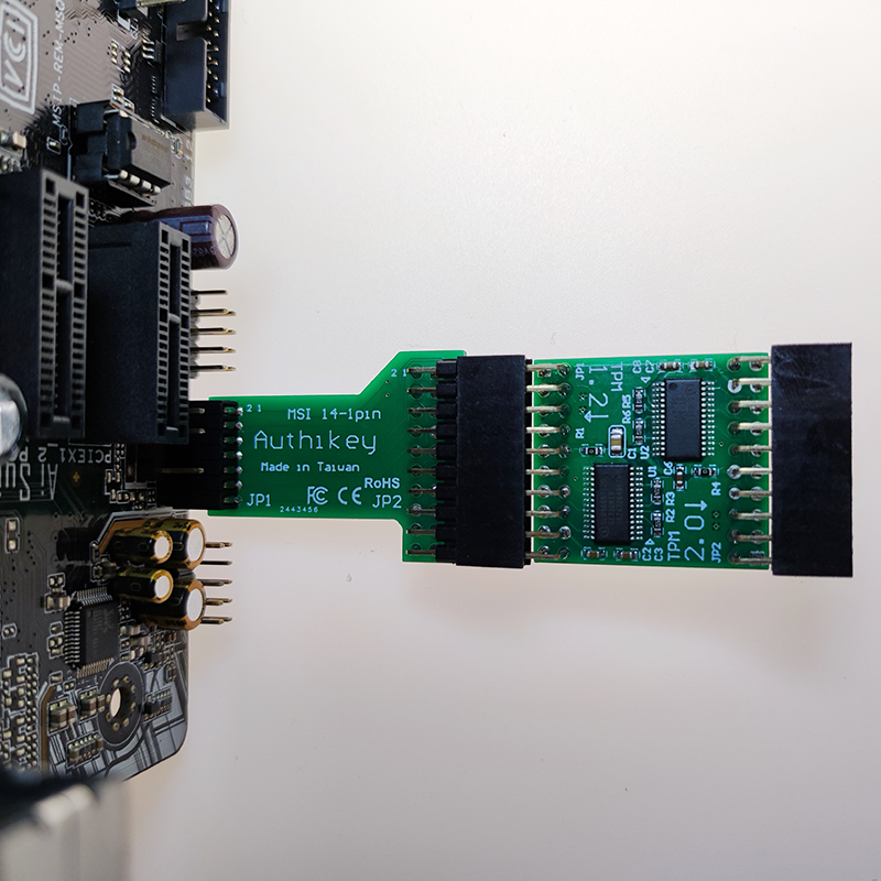 Authikey TPM module installed on an MSI motherboard header