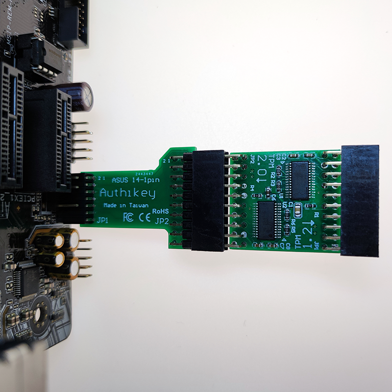 Authikey TPM module installed on an ASUS motherboard header